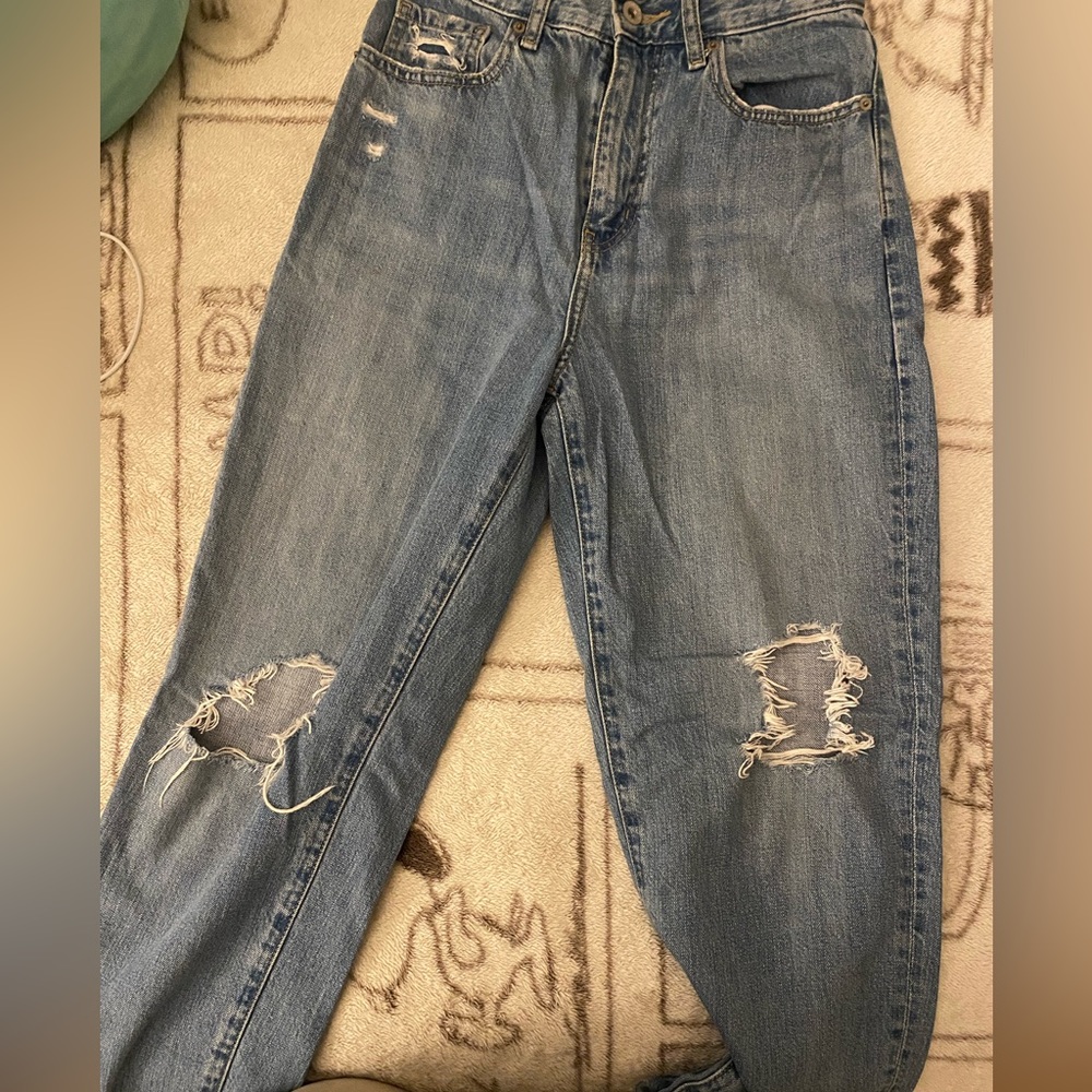 These are ripped jeans on the knees from Uniqlo.